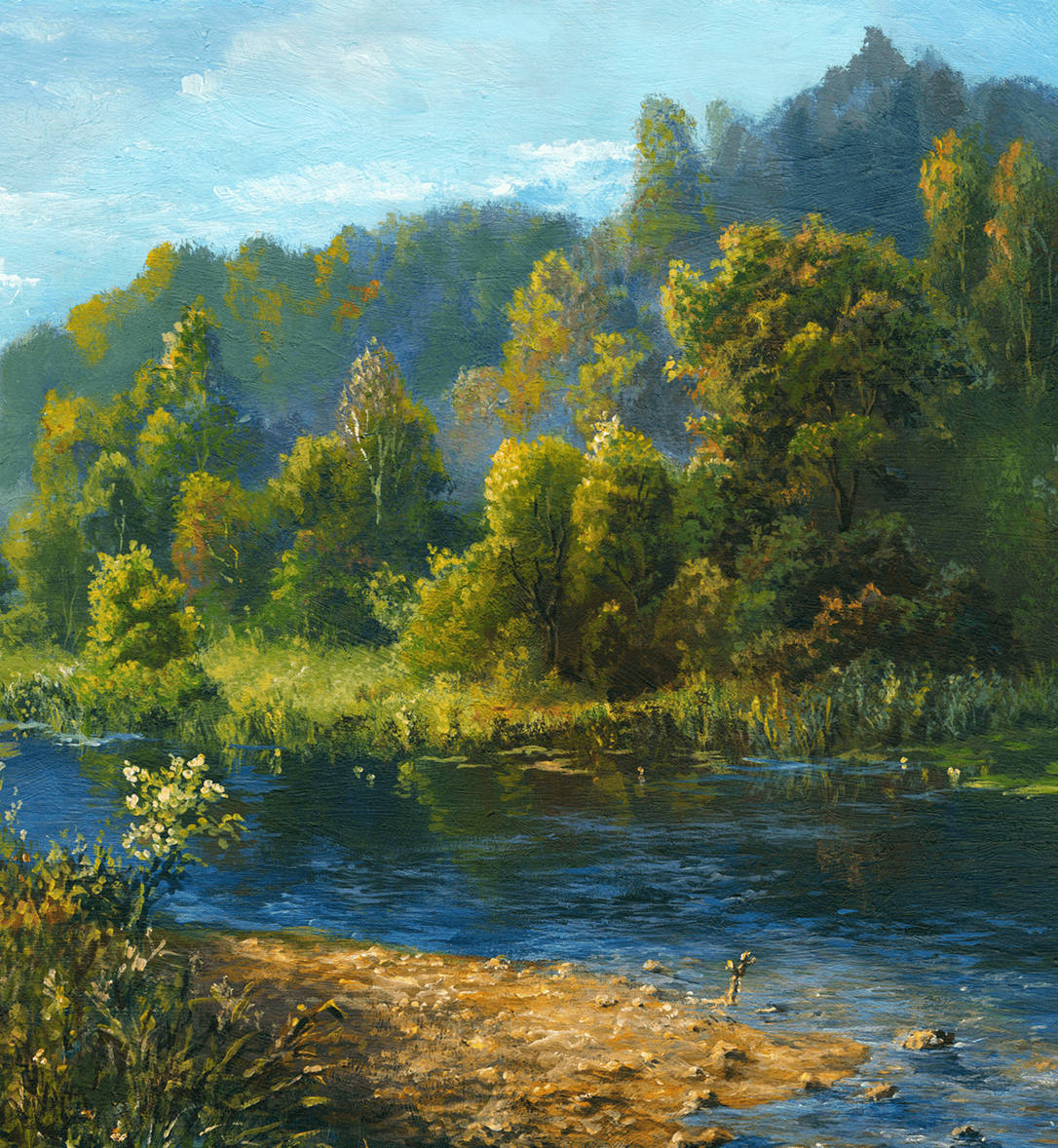 Scenic riverbank under blue sky
